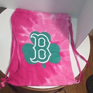 Pink Tie-Dye Drawstring Bag with Green Logo